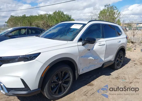 2023 Honda Cr-V Hybrid Sport Touring z USA, uszkodzony, nr VIN 5J6RS6H9XPL003899